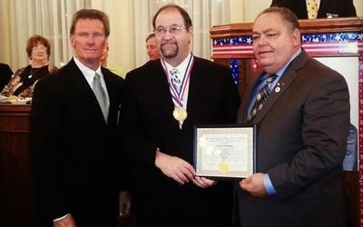 Nimitz High Decathlon Team Coach Greg Jackson Receives Award