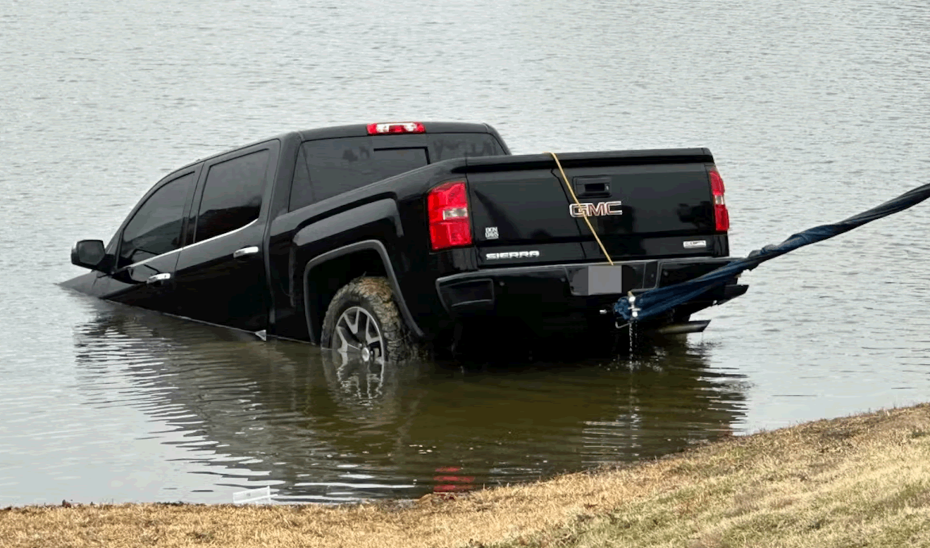 Driver that Confused Drive and Reverse Ends up in Mansfield Neighborhood Pond